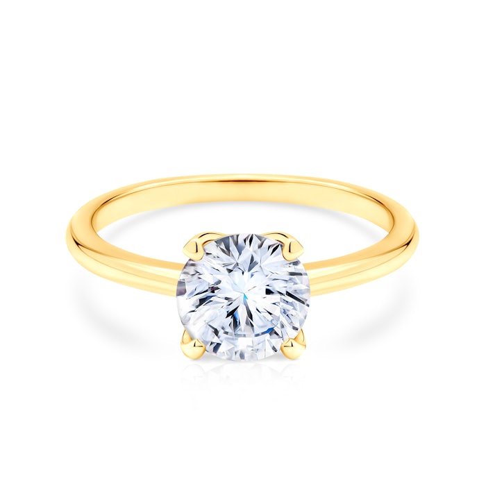 SAVICKI eljegyzési gyűrű: arany fehér zafírral