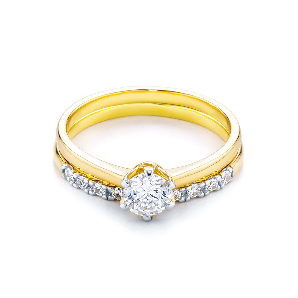 Side-Stone Engagement Ring: two color gold, cubic zirconia